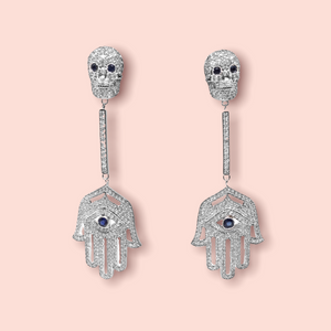 White diamond skulls and hamsa earrings